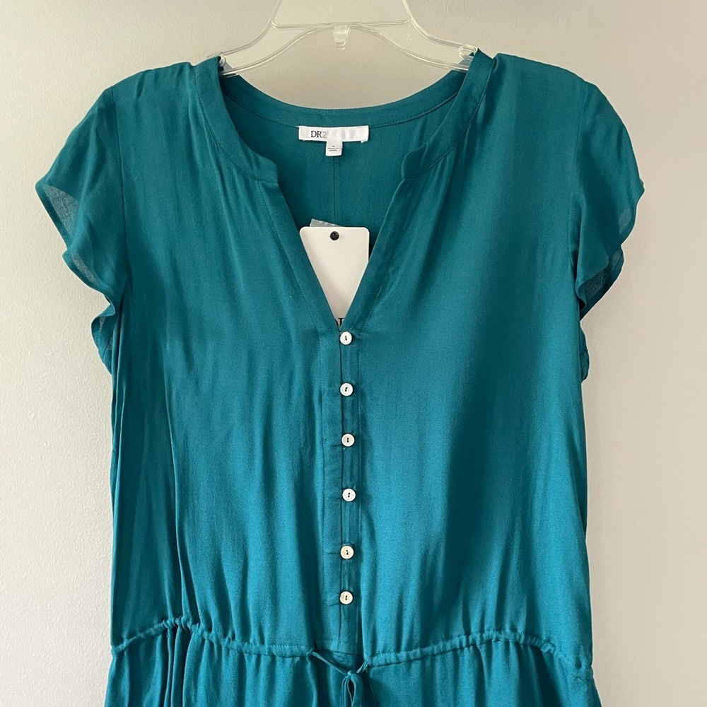 New with tags teal short sleeve blouse.